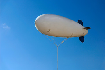 Airship Floating over Blue Sky © Alx