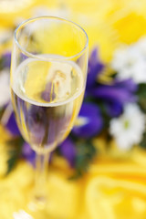 Elegant bouquet and glass of champagne