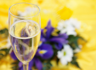 Elegant bouquet and glass of champagne