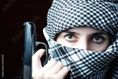 arab woman in keffiyeh with gun wall mural