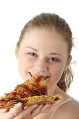 Young happy woman eating pizza