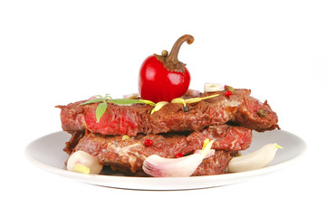 beef meat chunk on grey dish