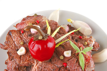 beef meat chunk on grey dish