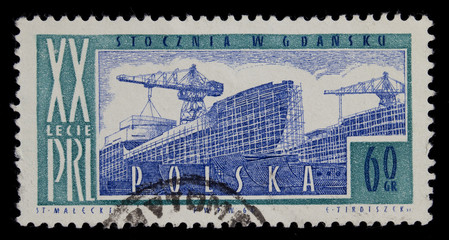 shipyard on vintage post stamp from Poland