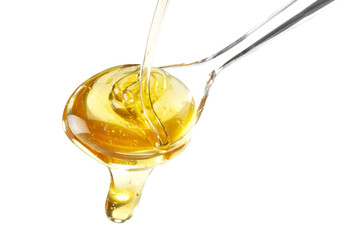 Glaslöffel mit Honig