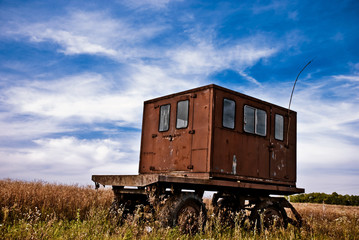 Fototapeta na wymiar rusty van at summer meadow