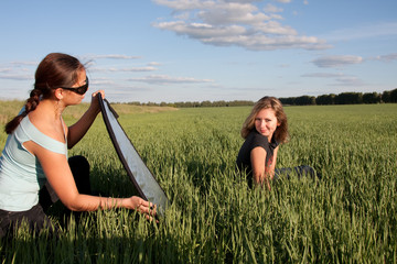 Phototographer assistant and model at work