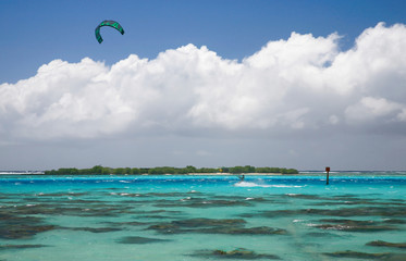 kitesurfer on a blue lagoon