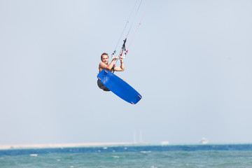 Kiteboarder jumps