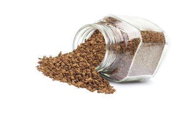 Instant coffee in glass bank on a white background.
