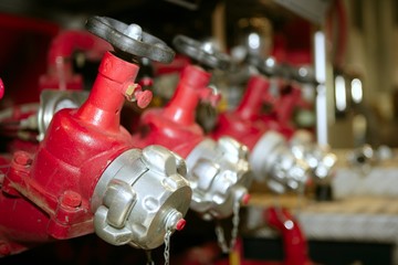 fire truck hose faucets in a row