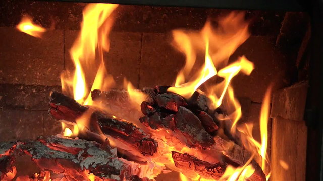 Burning wood in fireplace