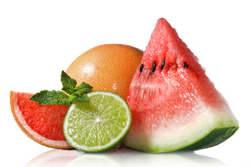 Watermelon, grapefruit and lime with mint isolated on white