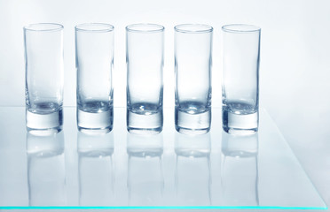 A row of glasses for vodka