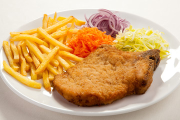 Fried pork chop with vegetables