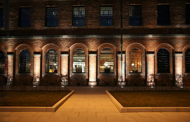 Old Converted Brick Railway Building At Night
