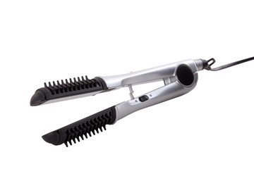 hair straighteners. Isolated over white