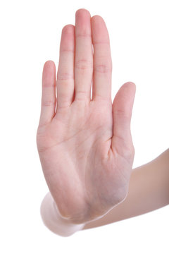 hand signaling stop against a white background