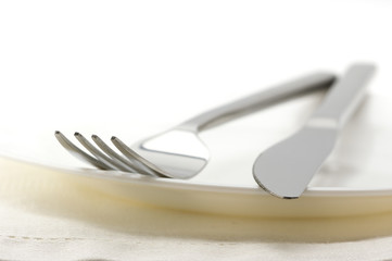 Silverware on plate close-up