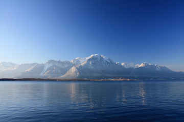 Mountain reflections in Lake Geneva, Switzerland
