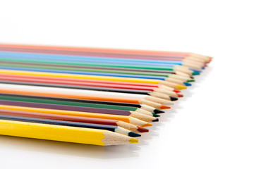 colored pencils on white background