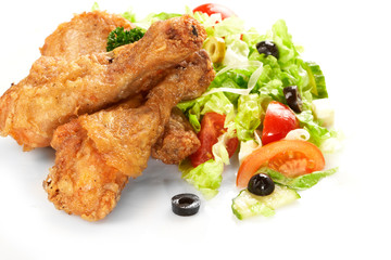 Chicken legs with fresh vegetables