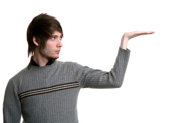 young man on white background with hand offering