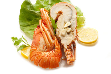 cutted lobster with lettuce and lemon