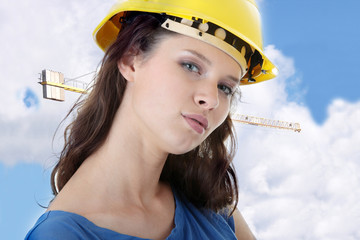 Sexy young woman construction worker contractor