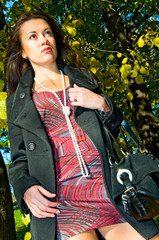 Fototapeta na wymiar portrait of young woman under the tree