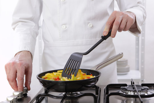 Chef roasting vegetables