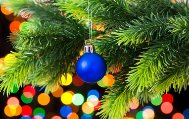 Obraz na płótnie Canvas Christmas decoration and blurred lights at background
