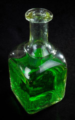 bottle  of green liquid