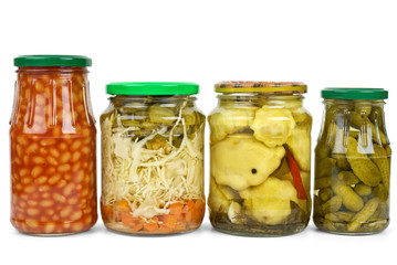 Glass jars with marinated vegetables