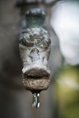 Naklejka na ściany i meble Water Drop from a Fountain