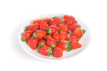 Isolated pile strawberry in white dish