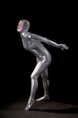 Beautiful girl in futuristic suit