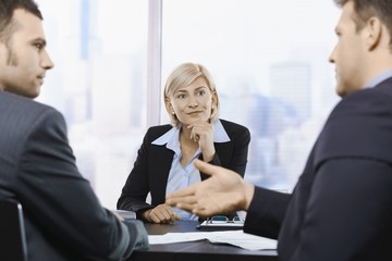 Businesswoman concentrating at meeting