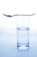 Water, spoon and pill