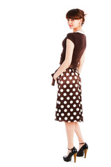 Young  sensuality beautiful girl in spotted skirt