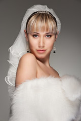 beautiful bride in white fur