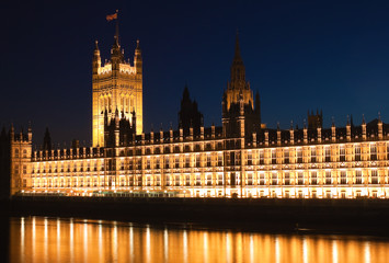 Fototapeta na wymiar The Houses of Parliament iluminated at night
