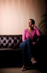 Obraz premium Dramatic light portrait of beautiful young woman.