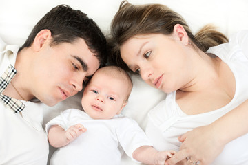 Fototapeta na wymiar happy family - mother, father and baby