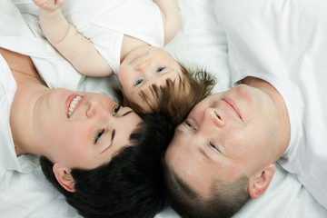 family home - father, mother and little daughter