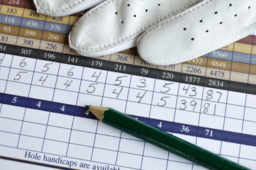 Golf Score Card with Glove and Green Pencil