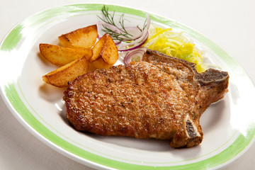 Fried pork chop with vegetables