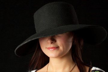 Glamour Woman in Black Hat and rose lipstick