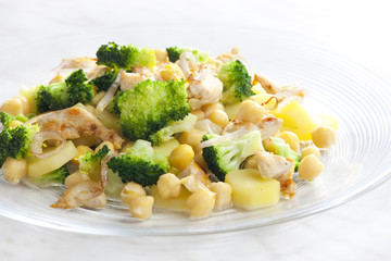 chicken meat with broccoli, chick peas and potatoes