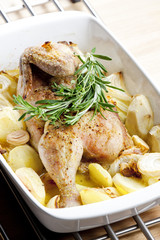 chicken baked with onion and potatoes